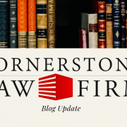 Photo of books with the Cornerstone Law Firm logo and the title "Blog Update"