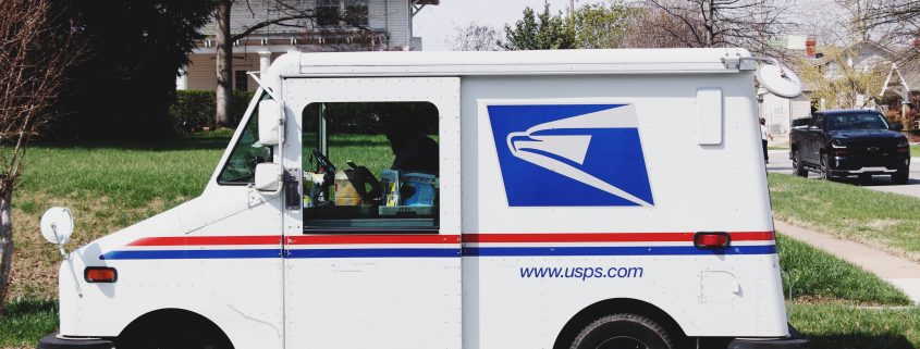 USPS mail carrier car