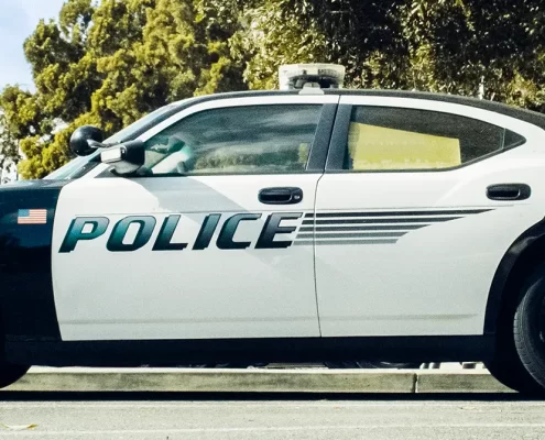A police car parked in a parking lot