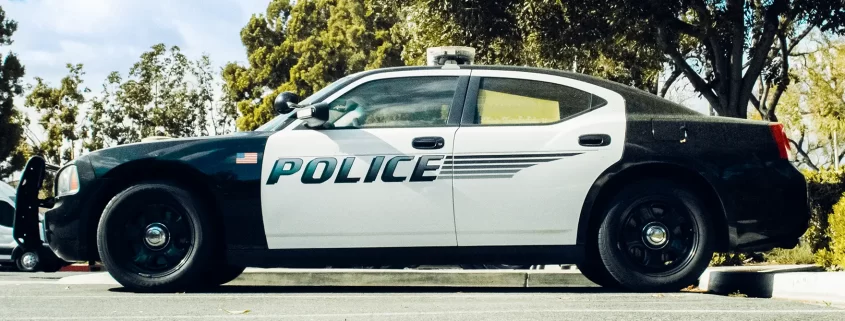 A police car parked in a parking lot