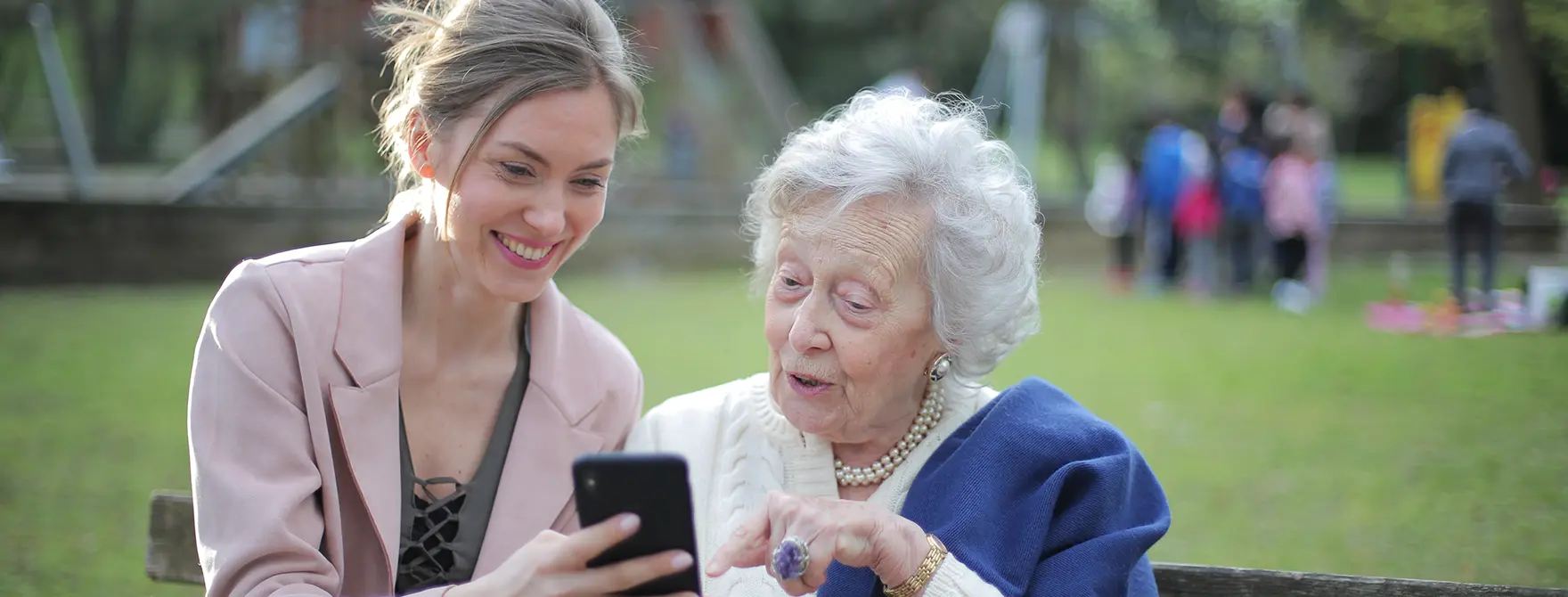 An adult woman with her adoptive elderly mother