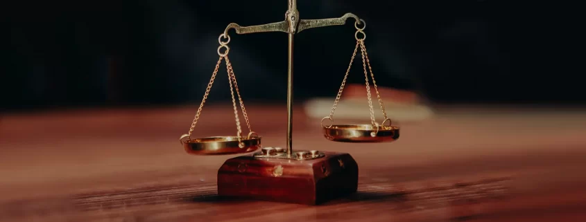 A close up of a set of scales on a wooden table