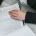 A woman signing a financial document