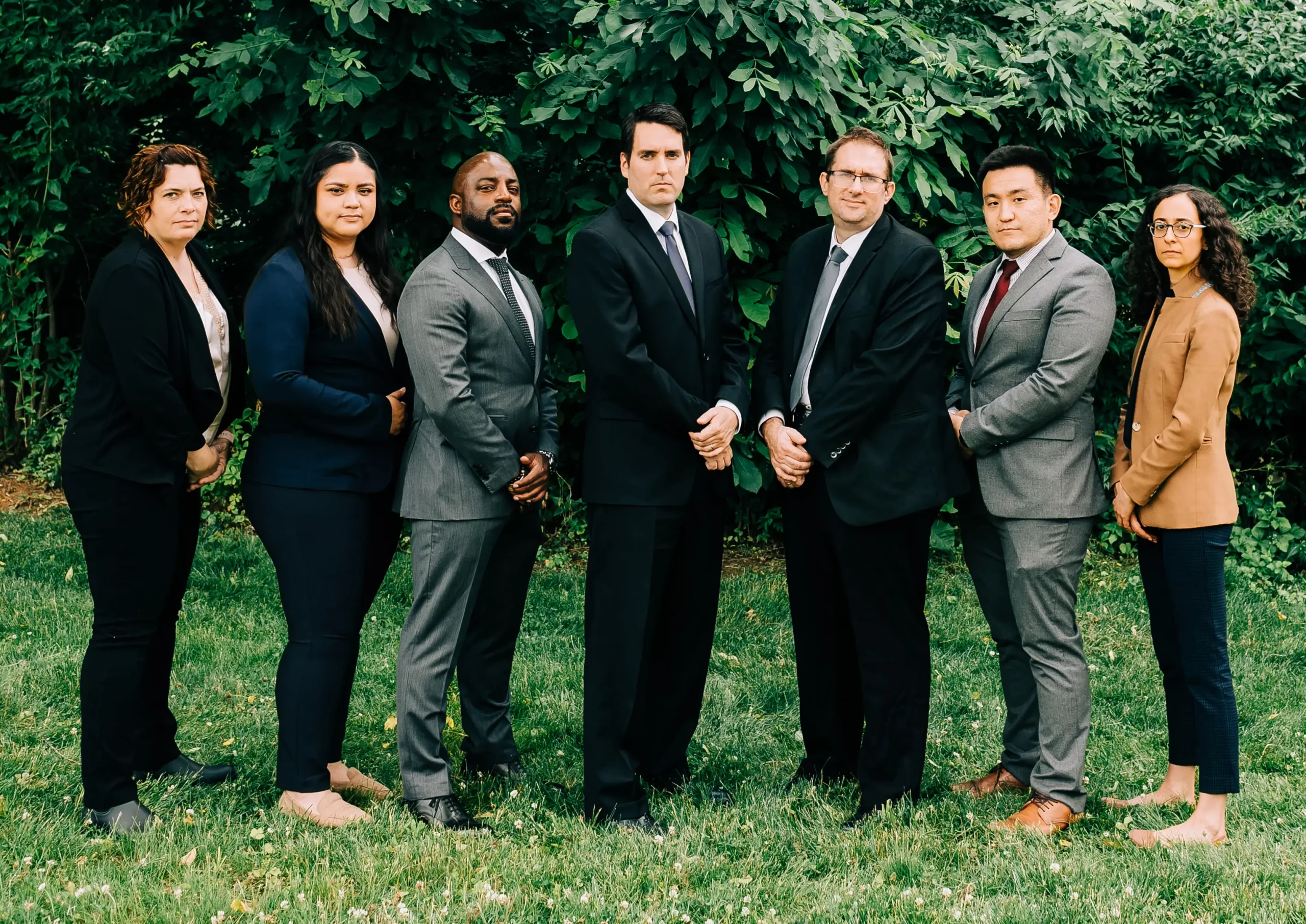 A group photo of the criminal defense team at Cornerstone. There are 2 paralegals and 5 attorneys.
