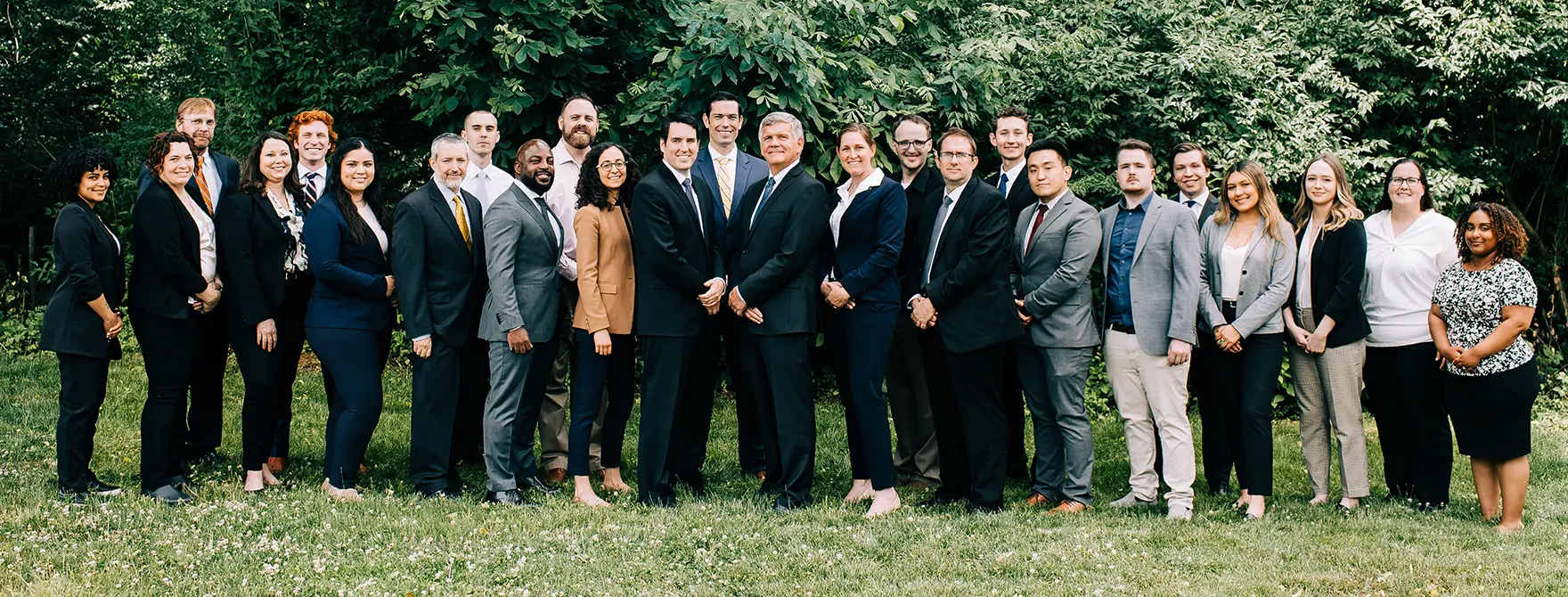 A group photo of all the paralegals, attorneys, administrative staff, and summer interns from Cornerstone Law Firm.