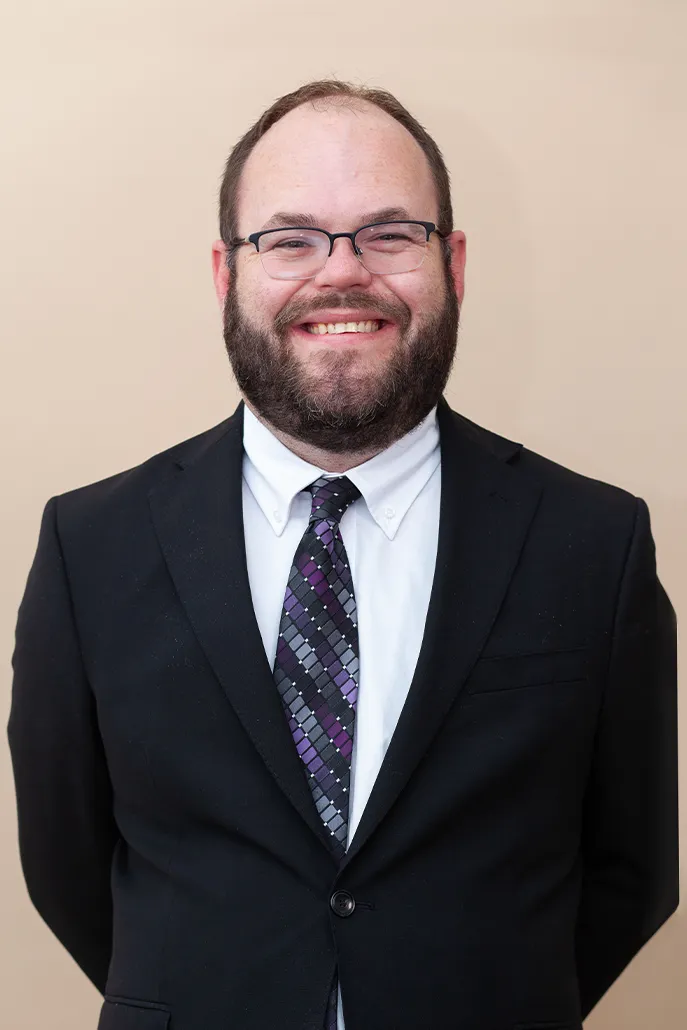 A headshot of Attorney Benjamin Lewis