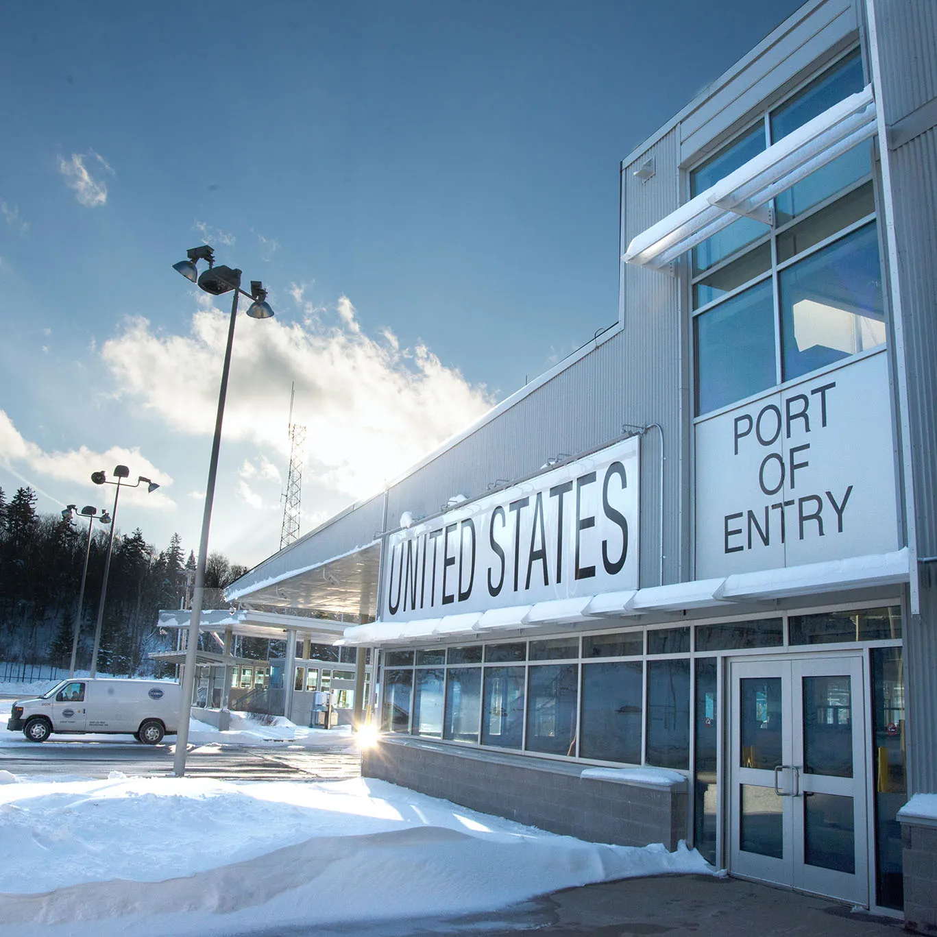 A United States port of entry on a sunny, snowy day