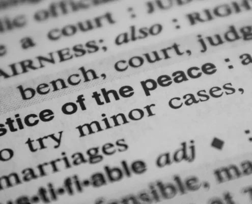 Close up of a dictionary definition for "Justice of the peace"