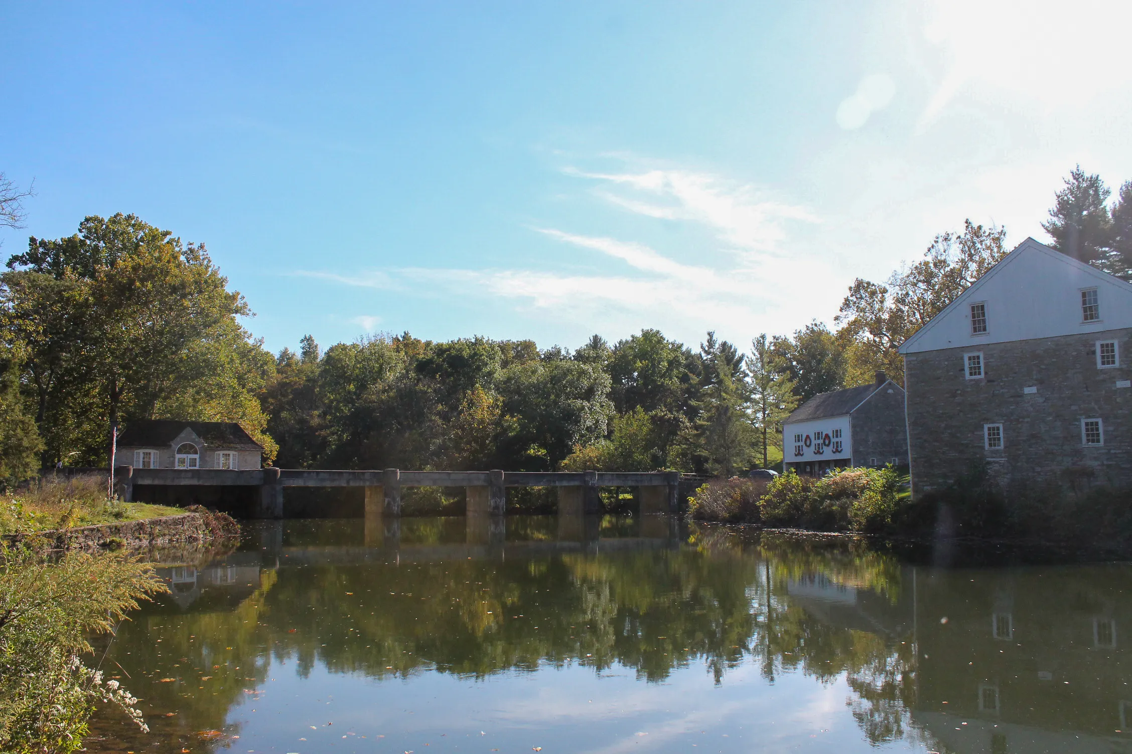 The water and bridge at Gring's Mill in Wyomissing on a sunny, fall day.