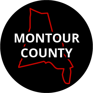 The words "Montour County" in a black circle with red outline of the county behind it. The image links to a page listing the county's Magisterial District Courts.
