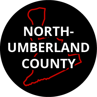 The words "Northumberland County" in a black circle with red outline of the county behind it. The image links to a page listing the county's Magisterial District Courts.