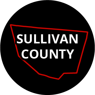 The words "Sullivan County" in a black circle with red outline of the county behind it. The image links to a page listing the county's Magisterial District Courts.