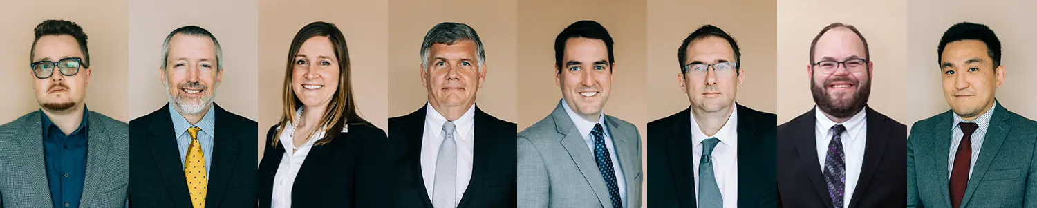 A composite of all the attorneys' headshots from Cornerstone Law Firm