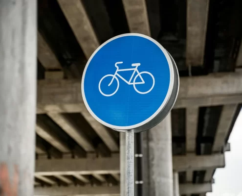 A blue bicycle road sign