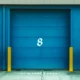 Blue garage doors from a self-storage facility